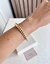 Bracelete mola torcido em banho ouro - comprar online