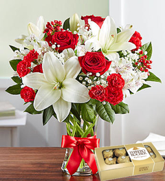 arreglo floral bouquet de lilium lirios y rosas rojas con florero de regalo y bombones