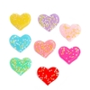 Aplique coração com recheio de estrelinhas (5 unid.) resina - cores mistas