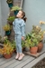 Nena con conjunto azul de sweater Grulla y Calza Calandria