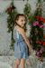 Nena con blusa Hortensia indigo, estampada con breteles de puntilla, combinado con falda Lavanda haciendo conjunto