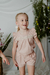 Nena con blusa Tulipán rosa, de lino en combinación con el short Azalea de lino en conjunto