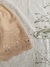 Detalle al bordado de la falda petunia beige