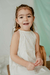 Nena con vestido Begonia, estilo halter de algodon con pechera bordada