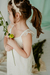 Nena con vestido Orquidea off white, de tul con volado en los breteles