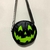 Mini mochila e bag 2 em 1 - abóbora tema halloween filme terror horror trash temática versão verde com preto na internet