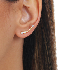 18k Gold Aries earrings with white Sapphires or Diamonds on internet