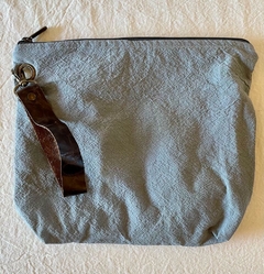 Bolso de mano con tira de cuero
