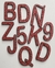 Set de letras y números de madera imantados en internet