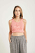 Top musculosa. Arma set con la falda tubo morley. 