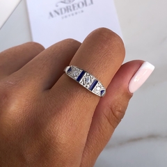 Anillo con cubics blancos y esmalte azul (cod an240)