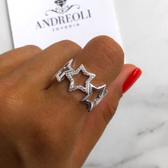 Anillo de Estrellas caladas con cubics regulable