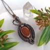 Colgante Cobre Viejo con Piedra Goldstone