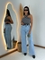 Calça jeans wide leg rasgados na internet