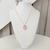 Conjunto colar e brinco de pedra gota rosa com zirconias banhado a ouro 18k - comprar online