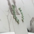 Brinco ear cuff festa folhas cristais verde claro, base prata - loja online