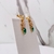 Brinco Ear cuff festa com pedras verdes e prata- Base dourada( Linha Premium) na internet