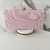 Bolsa clutch de telinha rosa bebê, com detalhes em dourado e fecho de bola