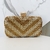 bolsa clutch dourada com detalhes em prata e puxador cravejado - comprar online
