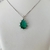 Colar com gota verde esmeralda com 9 pontos de luz prata banhado a prata - comprar online
