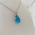 Conjunto colar e brinco gota azul claro com 4 pontos de luz banhado a prata - loja online