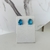 Imagem do Conjunto colar e brinco gota azul claro com 4 pontos de luz banhado a prata