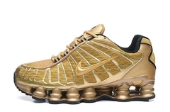 Nike shox gold schwarz hotsell