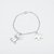 PULSERA CON 2 DIJES CADENA ROLO TEMATICO - comprar online