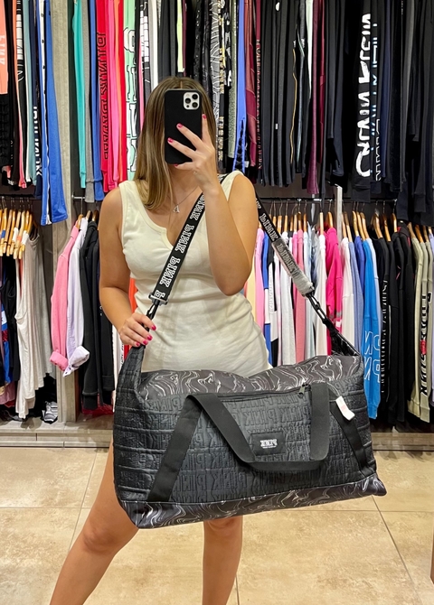 Bolsos pink precio sale