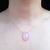 colar-de-prata-com-pingente-oval-grande-em-quartzo-rosa.jpg