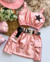 Conjunto de saia cargo e cropped estrela metalizado rosa