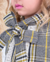 Conjunto de saia e casaco xadrez com detalhes amarelos (com ou sem a blusa) na internet