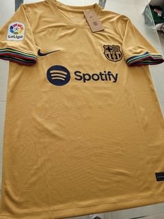 Camiseta Nike Barcelona Suplente Dorada Ronald Araujo 4 2022 2023 - Roda Indumentaria
