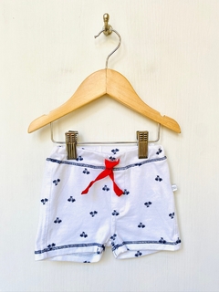 S (3/6m) | Cheeky | short blanco palmeras azules cordon rojo