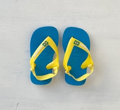 T19 | Havaianas | ojotas celeste tiras amarillas elastico atras