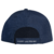 Vista trasera de la gorra Nox azul marino con ajuste de velcro y lema "makes you improve".