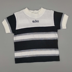 Remera Gluck Talle 0 meses blanca con franjas negras y grises