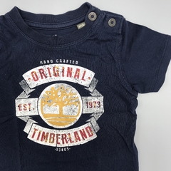 Remera NUEVA Timberland Talle 6 meses azul oscuro espamta blanco amarillo y rojo - comprar online