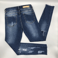 Jeans Mici Counture Talle 24 azul escritura blanco roturas en internet