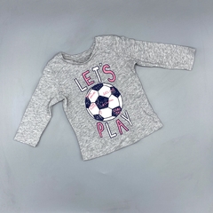 Remera NUEVA Carters Talle 6 meses lets play