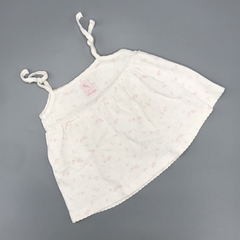 Remera Cheeky Talle S (3-6 meses) algodón blanca florcitas blancas tira regulable
