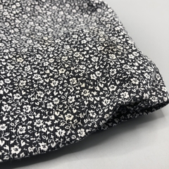 Imagen de Segunda Selección - Vestido Cheeky Talle L (9-12 meses) gabardina negro mini florcitas blancas lazo