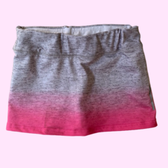 Pollera deportiva gris y rosa con cintura elástica y short interno Fly Sports - 8A