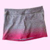 Pollera deportiva gris y rosa con cintura elástica y short interno Fly Sports - 14A