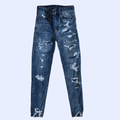 Pantalón de jean celeste con roturas American Eagle - 14A