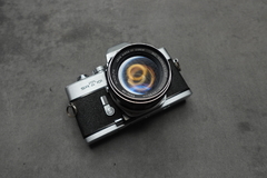 Minolta SRT 101 con optica Rokkor 58mm f 1,4 - comprar online