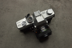 Minolta SRT 101 con optica Rokkor 50mm f 1,7 en internet