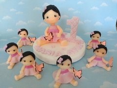 Souvenirs 10 nenas primer añito y Adorno de torta en internet