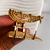 BROCHE BRENY BRIDGE GOLD en internet