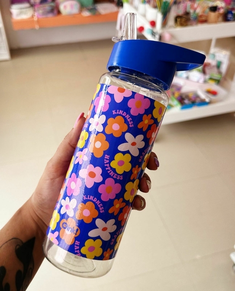 Botella con pico flores azul